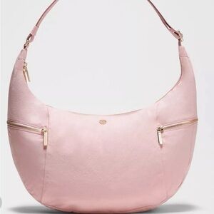 Lululemon PINK HAZE slouchy sling 13L metal hardware